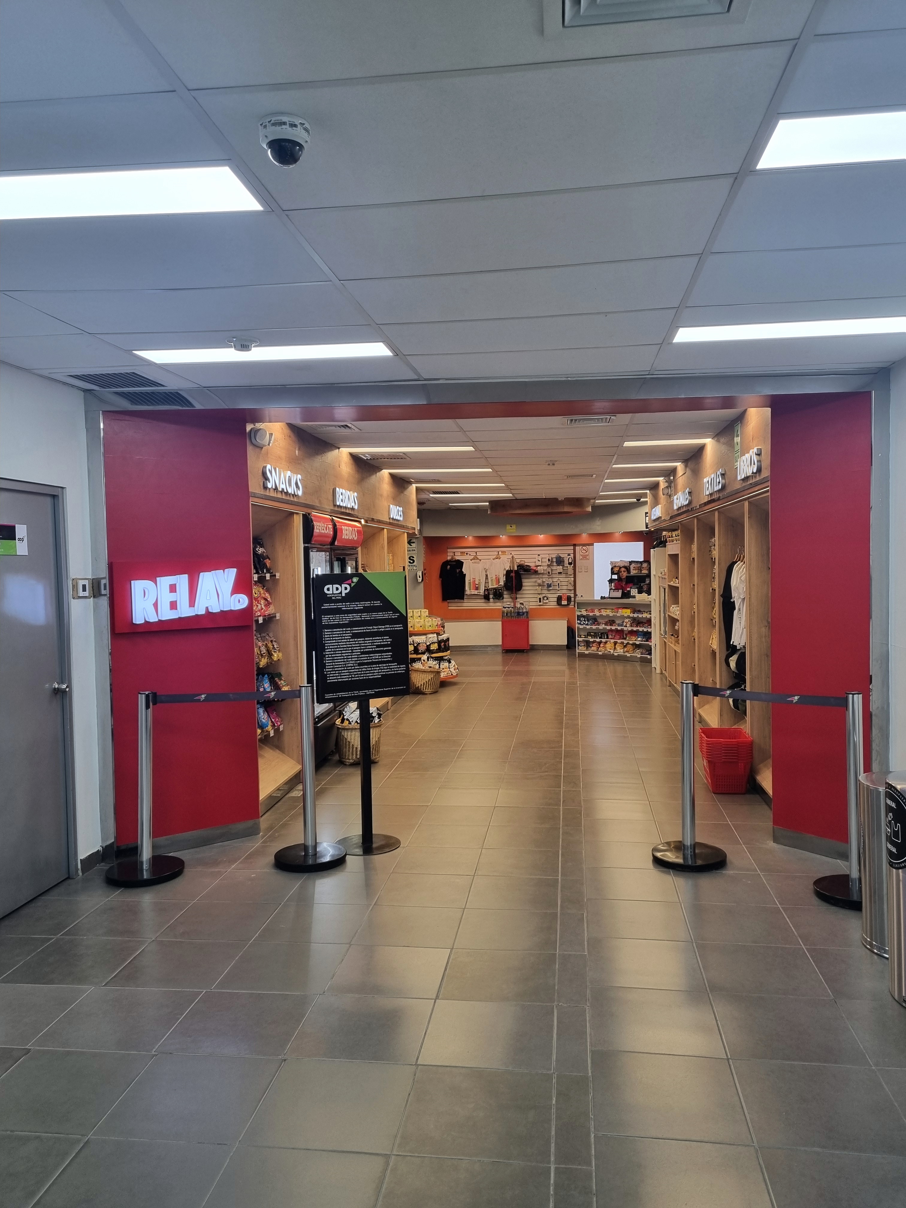 Completed RELAY airport store with modular fixtures beside the boarding area in Trujillo